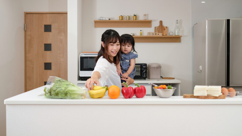 Level Up Your Japanese Kitchen With These 5 Appliances Asian mother and daughter preparing for lunch in the kitchen